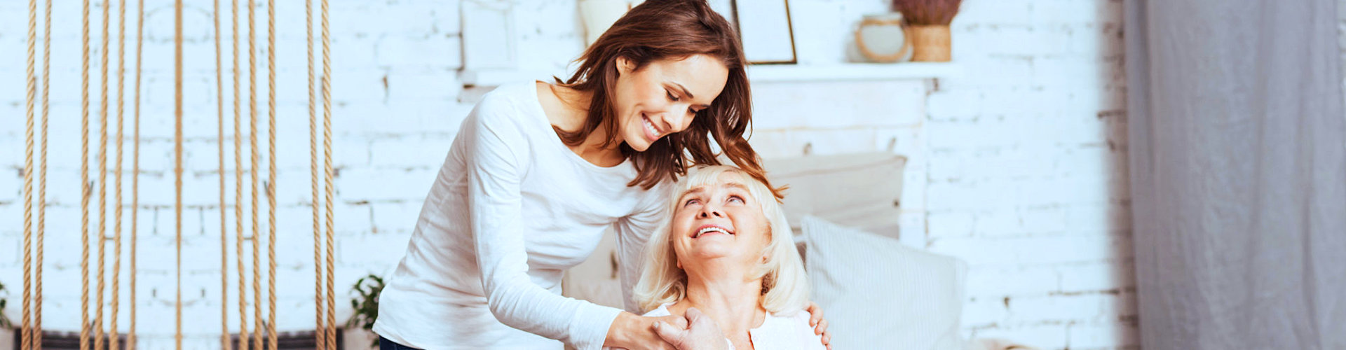 senior looking at lady behind smiling